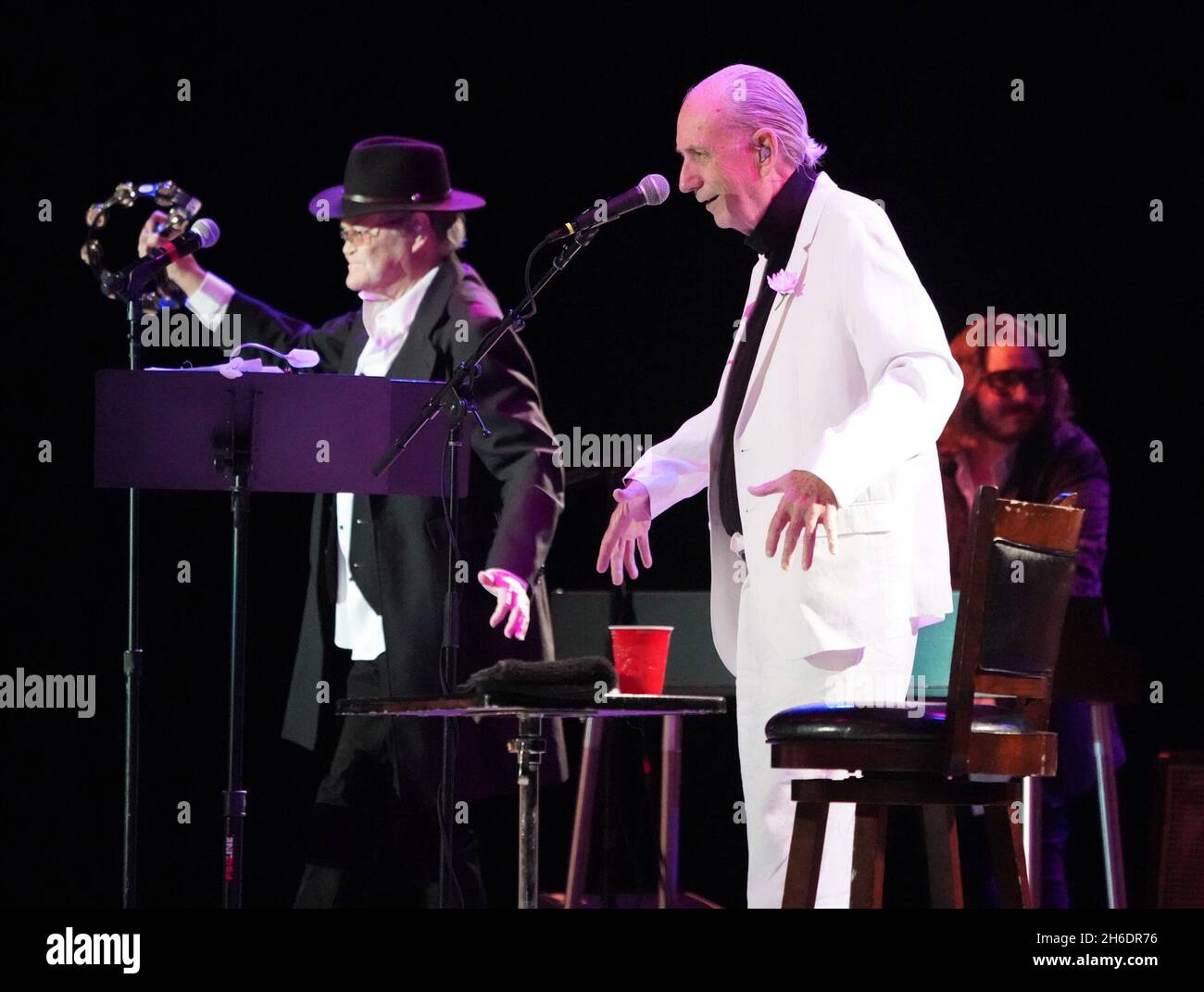 November 14, 2021, Los Angeles, California, USA: MICHAEL NESMITH and MICKY DOLENZ on stage together for the last time as they wrapped up the Monkees 2021 Farewell Tour at the Greek Theater, Los Angeles, CA, USA. The farewell tour will mark the end of a unique project that began in 1965 when four young men were cast in a television show about a struggling rock band that was inspired by the Beatles 'A Hard Day's Night.'Formed in Los Angeles for the eponymous television series, the quartet of Dolenz, Nesmith, the late Peter Tork and the late Davy Jones brought a singular mix of pop, rock, psyched Stock Photo