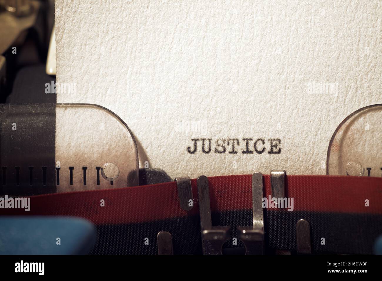 The word justice written with a typewriter Stock Photo Alamy