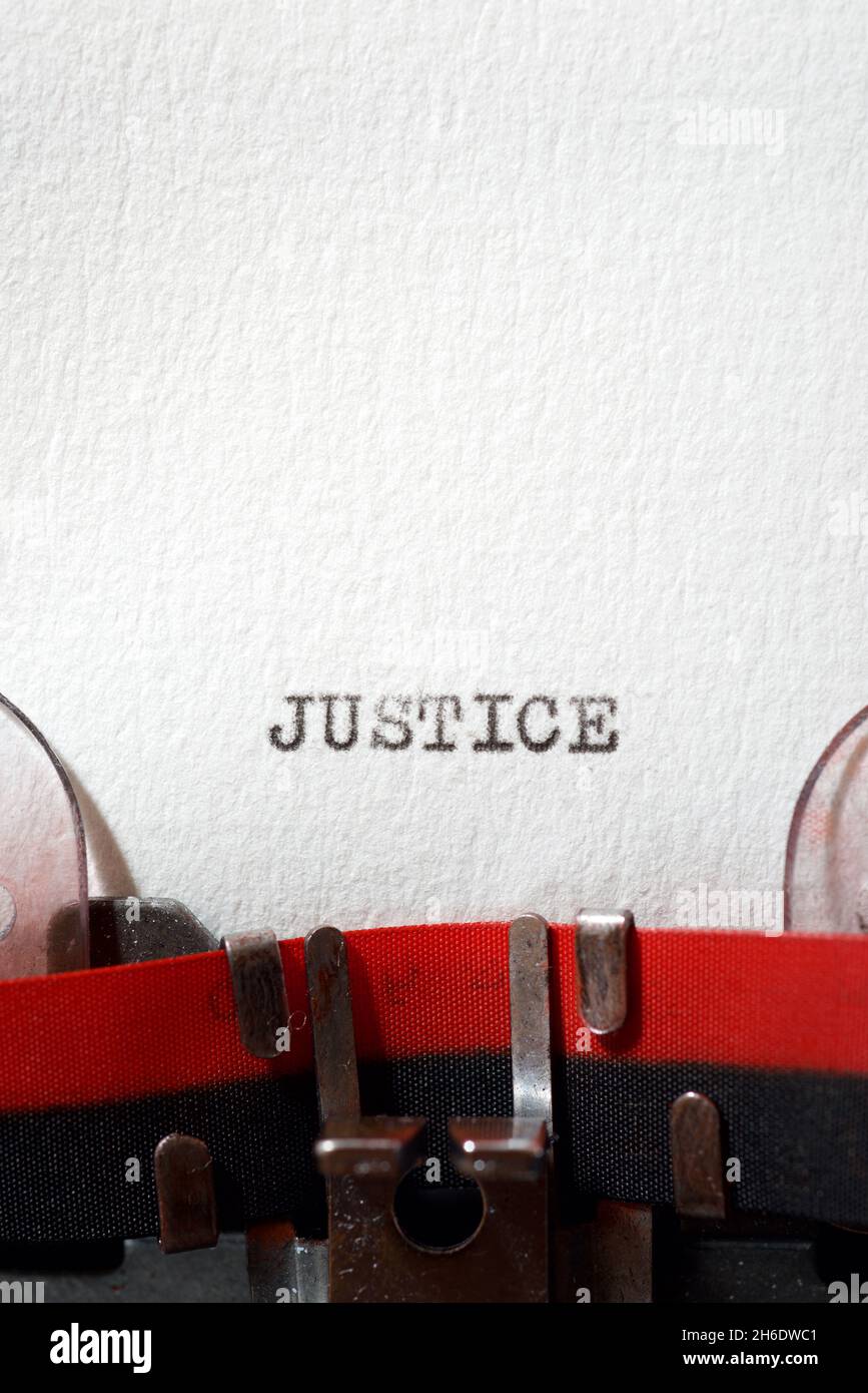 The word justice written with a typewriter Stock Photo Alamy