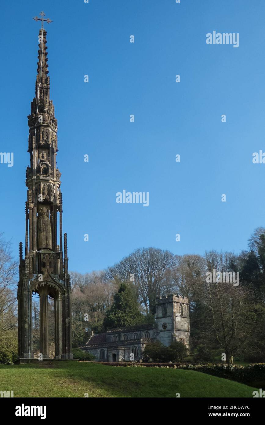 The medieval gothic Bristol Cross and St Peter's church, Stourhead, Stourton, Wiltshire, England, UK Stock Photo