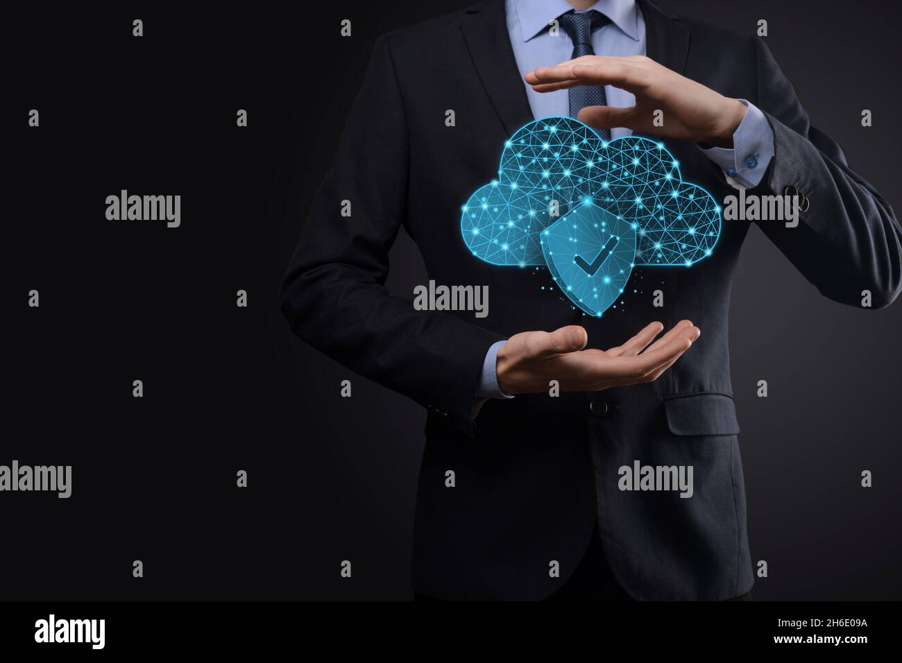 Cloud technology. Polygonal wireframe cloud storage sign with shield with a tick on dark blue. Cloud computing, big data center, future infrastructure Stock Photo