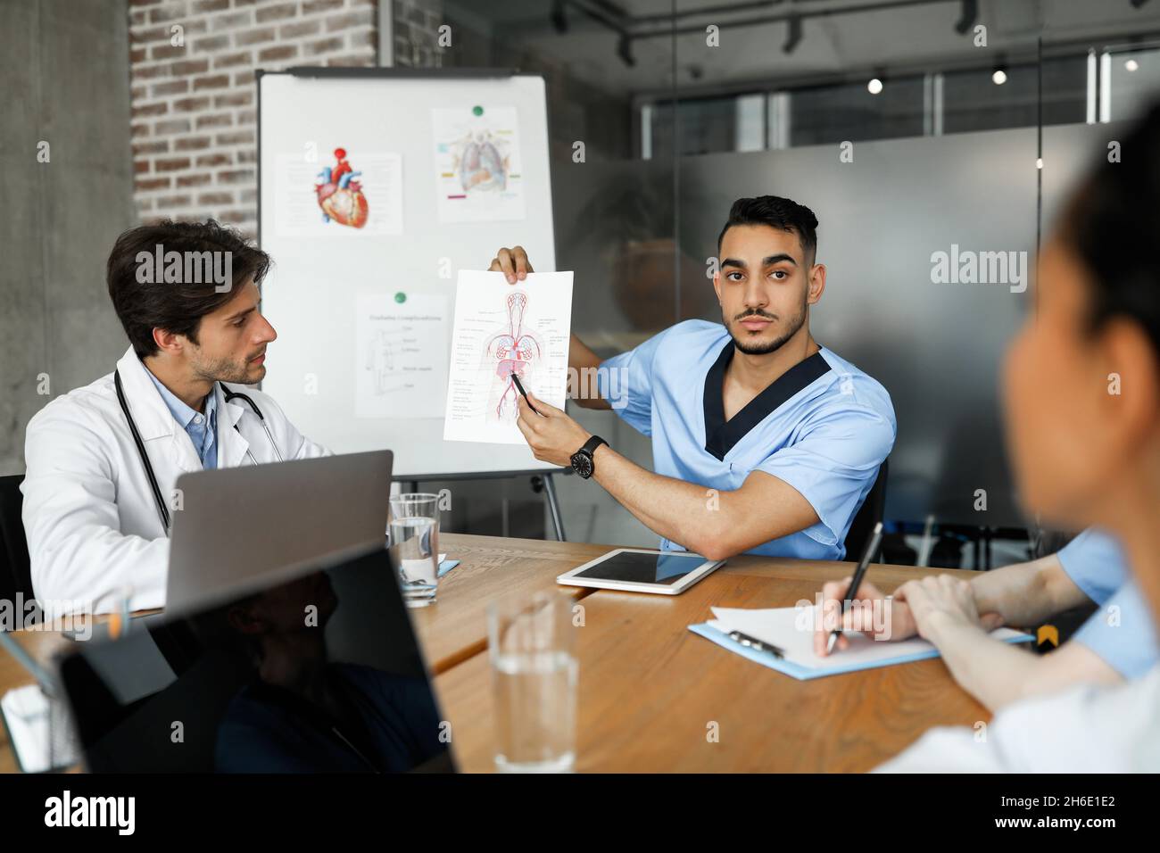 Middle eastern man doctor having speech while medical conference Stock Photo