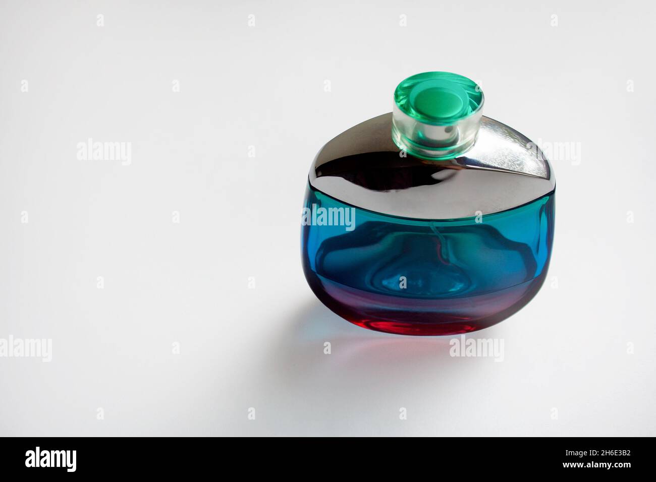 Ultramarine glass perfume bottle isolated on white background Stock Photo