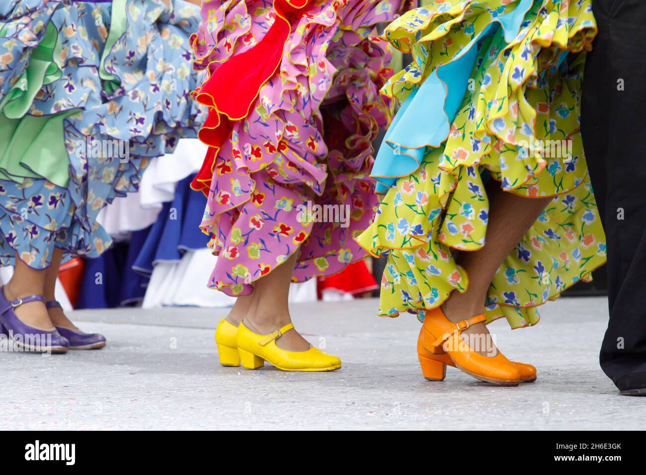 Flamenco dancers in colorful costumes Stock Photo
