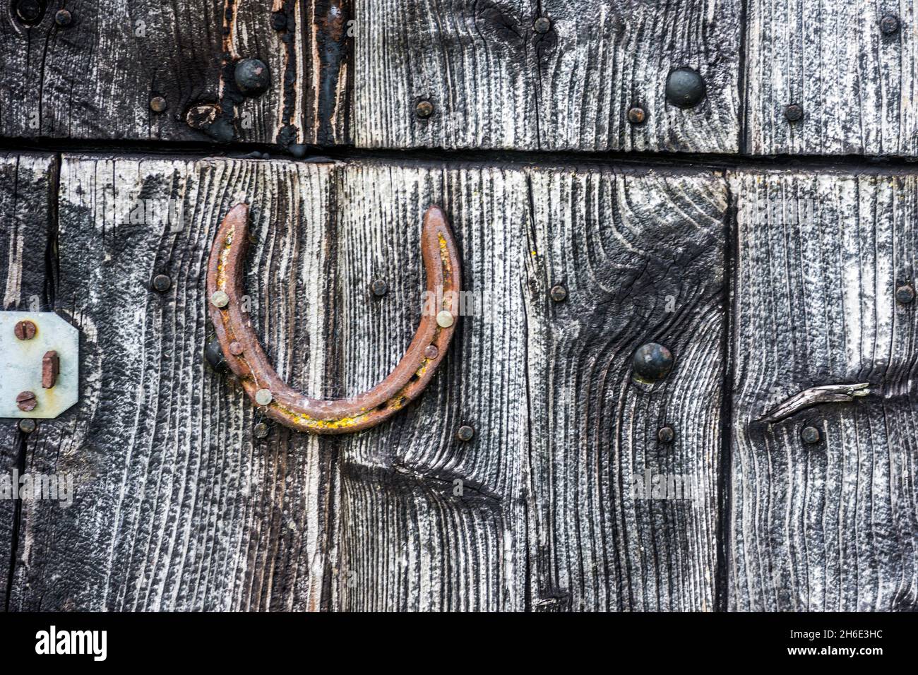 A good luck horseshoe on a barn door at Dunsop Bridge, Lancashire, UK