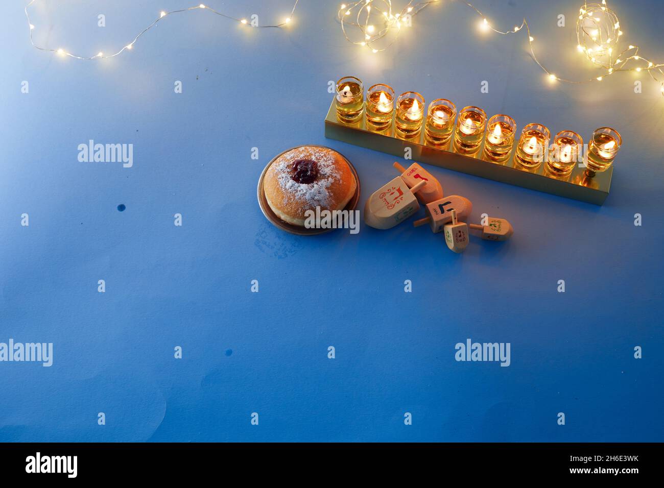 Jewish holiday Hanukkah background with menorah traditional candelabra