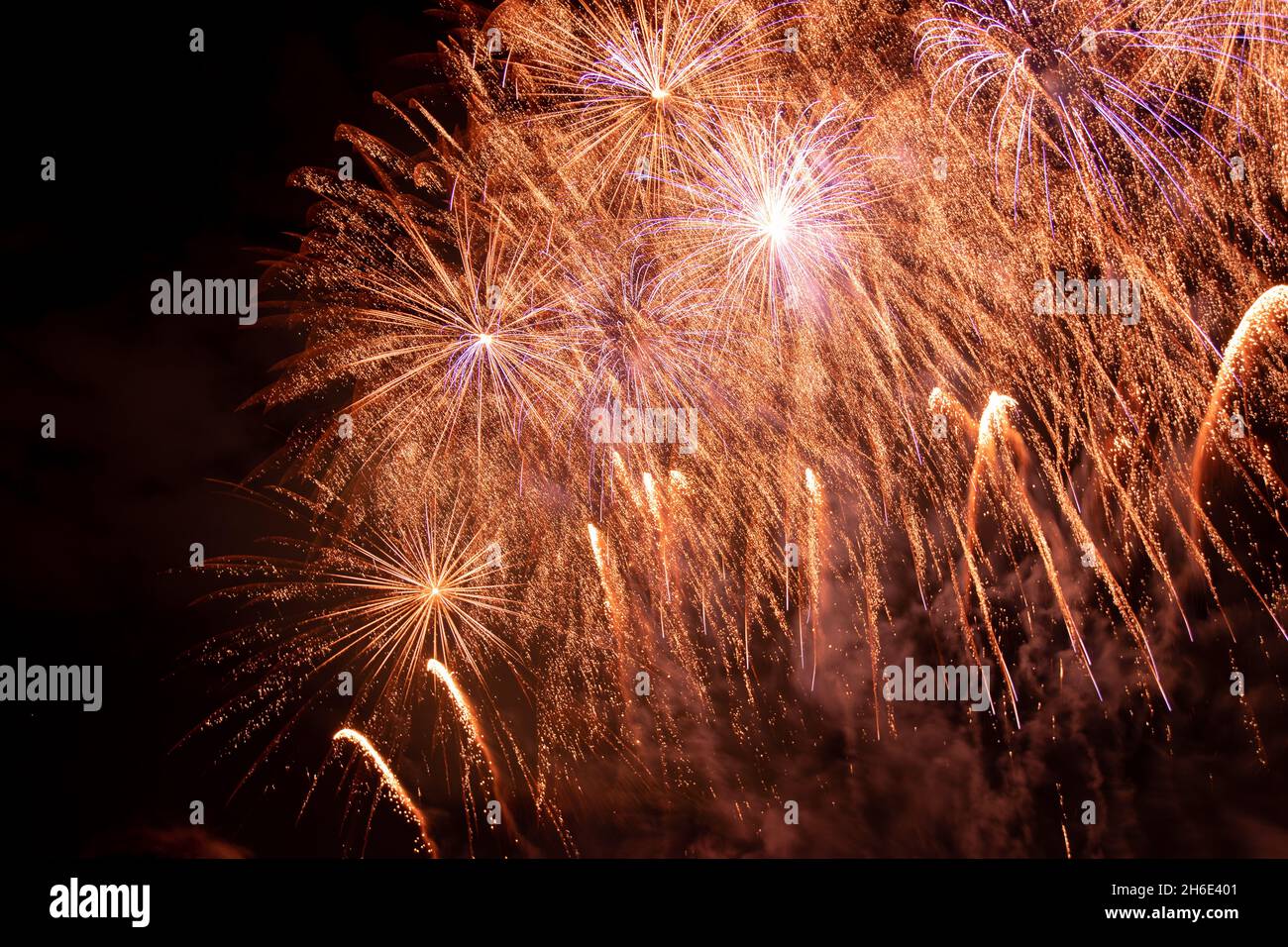 Beautiful New Year Fireworks. Dark Sky. Stock Photo