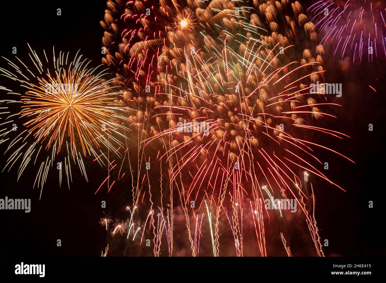 Beautiful New Year Fireworks. Dark Sky. Stock Photo