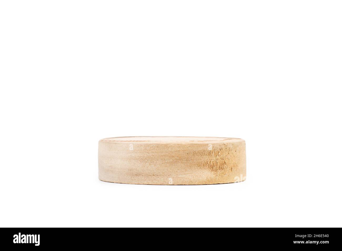 A round wooden base on a white background with copy space Stock Photo