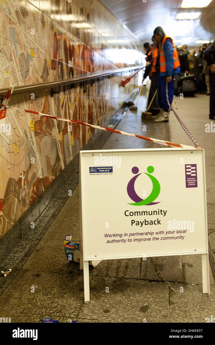 Royal clean up; Offenders help clean up in preparation for the Royal Wedding- Offenders scrubbed the pedestrian tunnels underneath Hyde Park Corner Tube Station in London this morning as part of a Community Payback scheme, managed by London Probation Trust.  Stock Photo