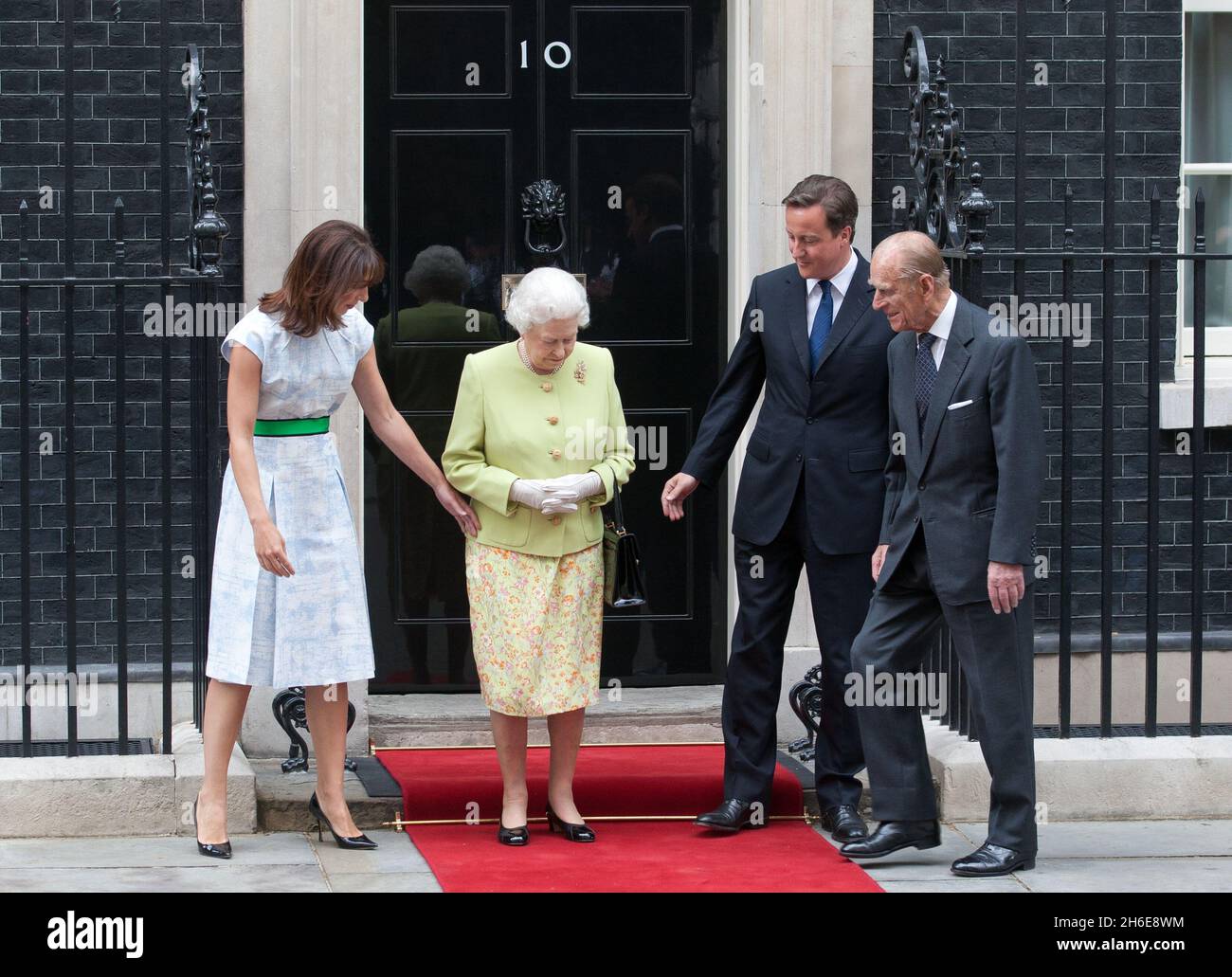 The Queen paid a rare visit to Number 10 Downing Steet today for lunch ...