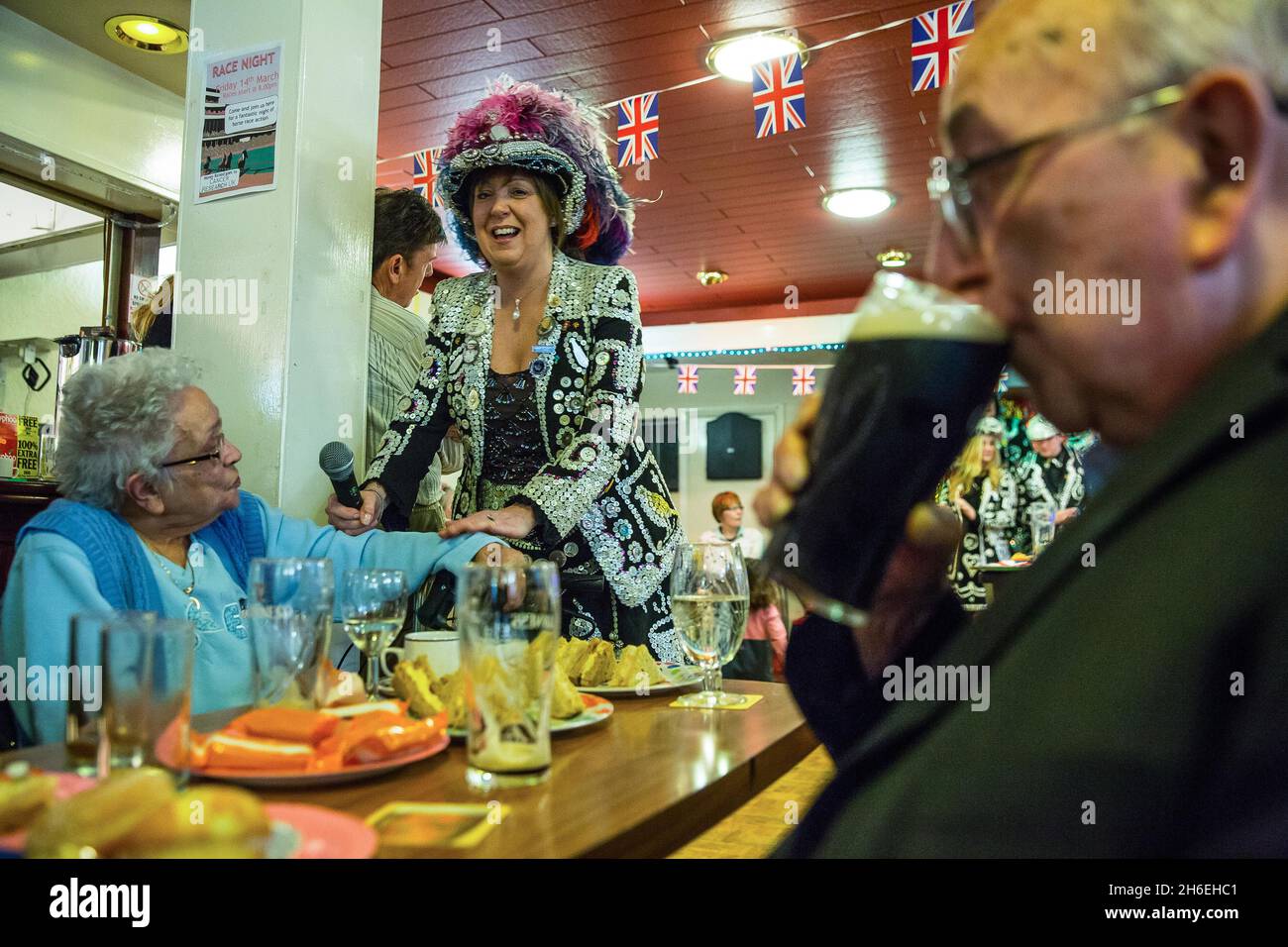 Contact the Elderly attend a tea party hosted by Pearly Kings and Queens at the Leytonstone & District Ex Servicemen's club in East London. Contact the Elderly was founded 49 years ago and offers those who do not have a support network of friends or family something to look forward to one Sunday afternoon each month.  Stock Photo