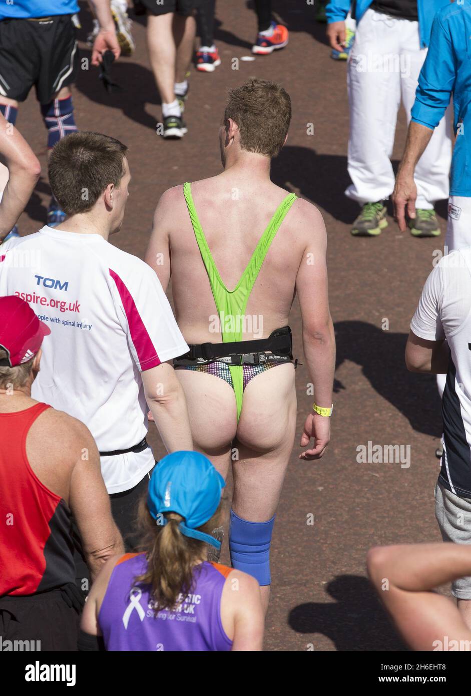 A runner at the finish line at the London Marathon Stock Photo