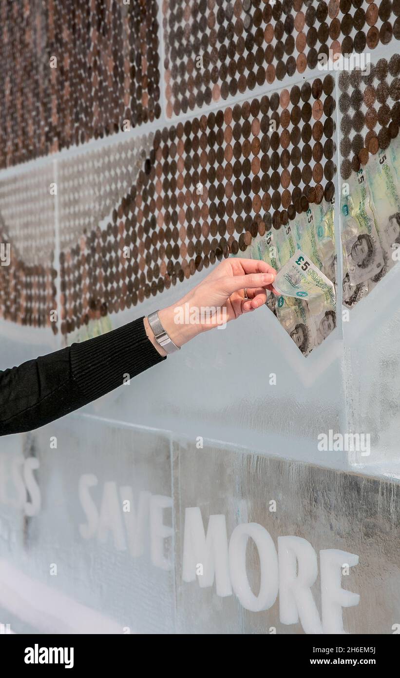 A 20foot frozen billboard made entirely of ice and cash was unveiled