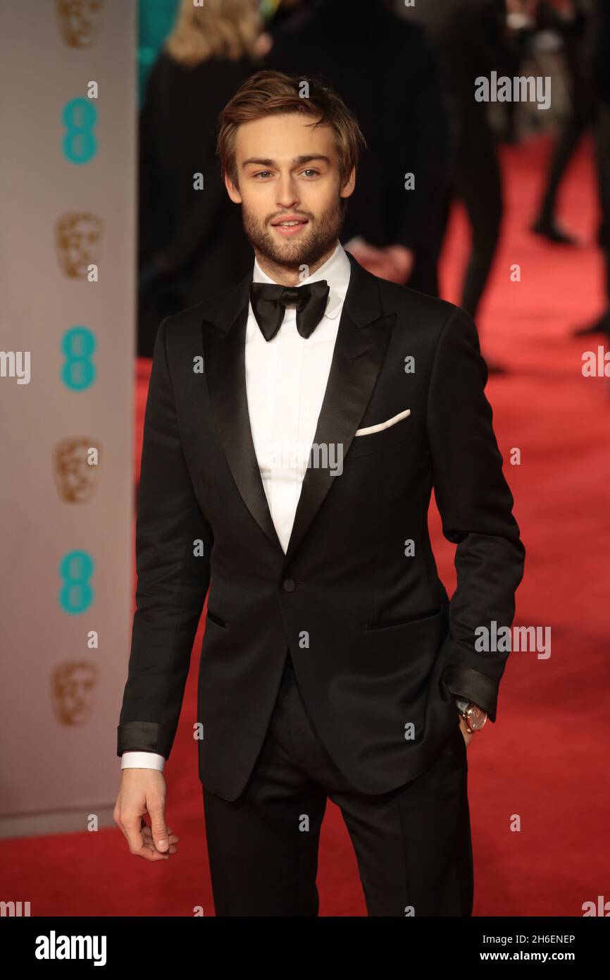 Douglas Booth attends the BAFTA awards at the Royal Opera House in London.  Stock Photo