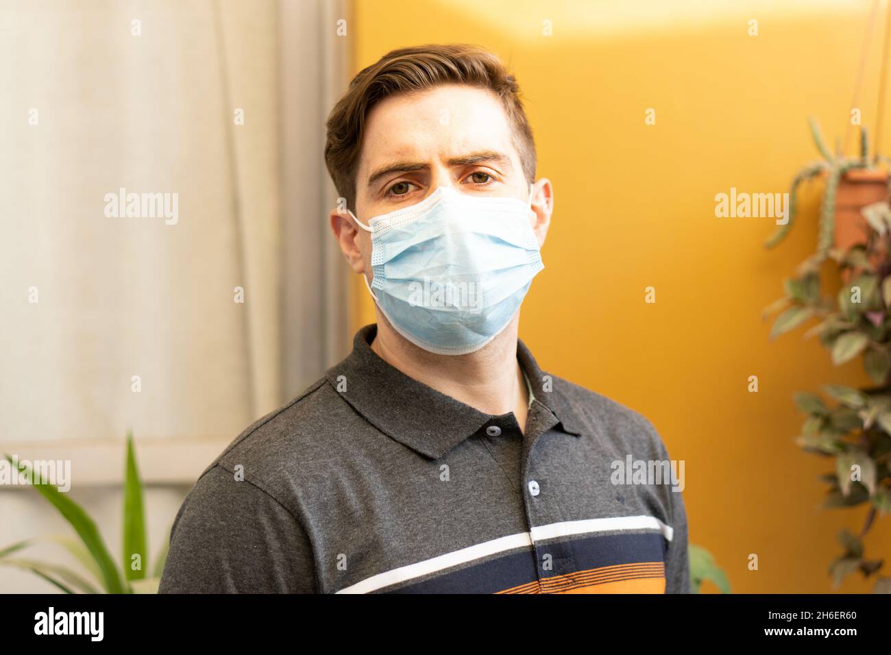 Handsome Argentinian man wearing face mask outdoors Stock Photo - Alamy