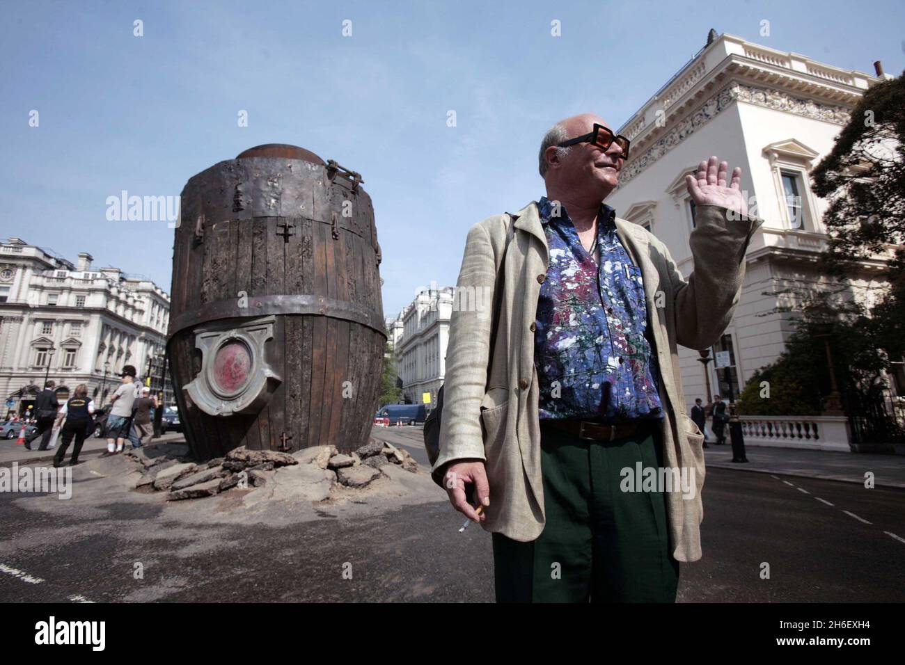 A giant smoking rocket was buried in the street in Waterloo place, London. Part of The Sultan's Elephant, a street theatre show by French company Royal De Luxe. Stock Photo
