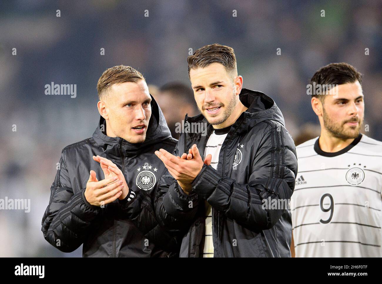 David Clapping Group half left right football hi-res stock photography and images - Alamy