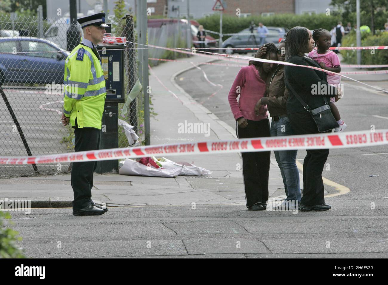 Friends of Sian at the murder scene in Mann Close, Croydon. Two teenage ...