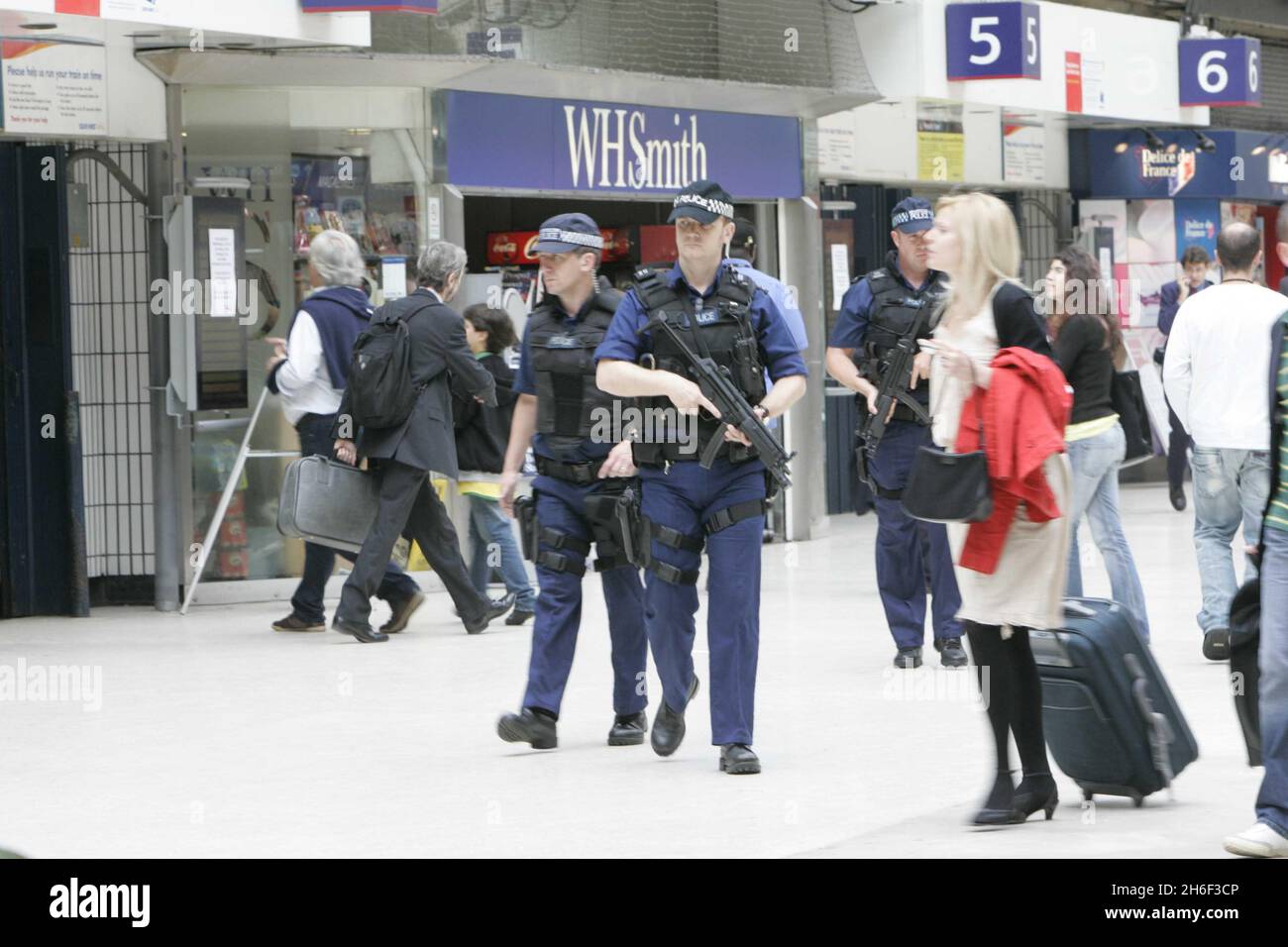 Armed police officers pictured at Waterloo station in London this afternoon, July 2, 2007. The UK has increased security after the recent attempted terror attacks. Stock Photo