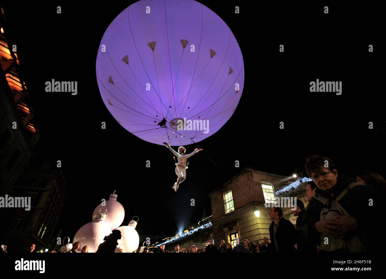 Heliosphere performing at London's Covent Garden as part of it's Christmas Deluxe season of events. Stock Photo