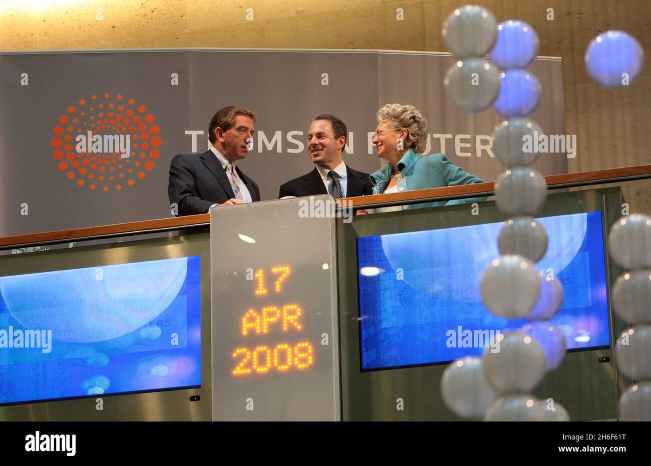 Deputy Chairman of Thomson Reuters, Niall FitzGerald (L), Chief Executive Officer Devin Wenig of Markets Division Thomson Reuters and Chief Executive Officer of the London Stock Exchange Clara Furse, as shares in the newly merged Thomson Reuters information company debuted on the London Stock Exchange this morning. The combined Thomson-Reuters Corp will compete directly with Bloomberg in financial news and information, with each commanding about a third of the market. Thomson Reuters has more than 50,000 employees with operations in 93 countries. Stock Photo