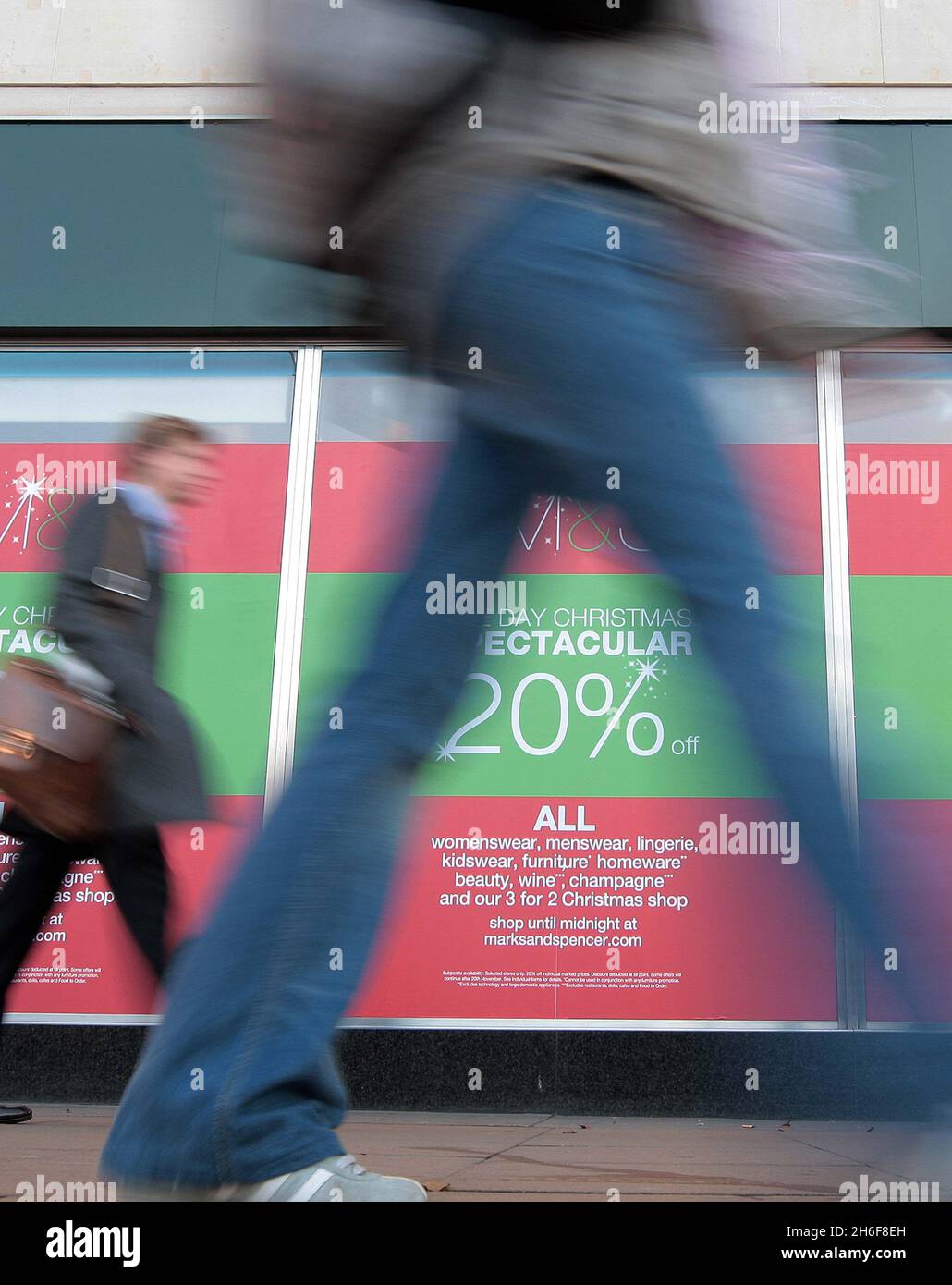 There was no stampede of customers as shops on Oxford Street in London, including Marks & Spencers and Debenhams, opened early for the start of their percentage off sales. Stock Photo