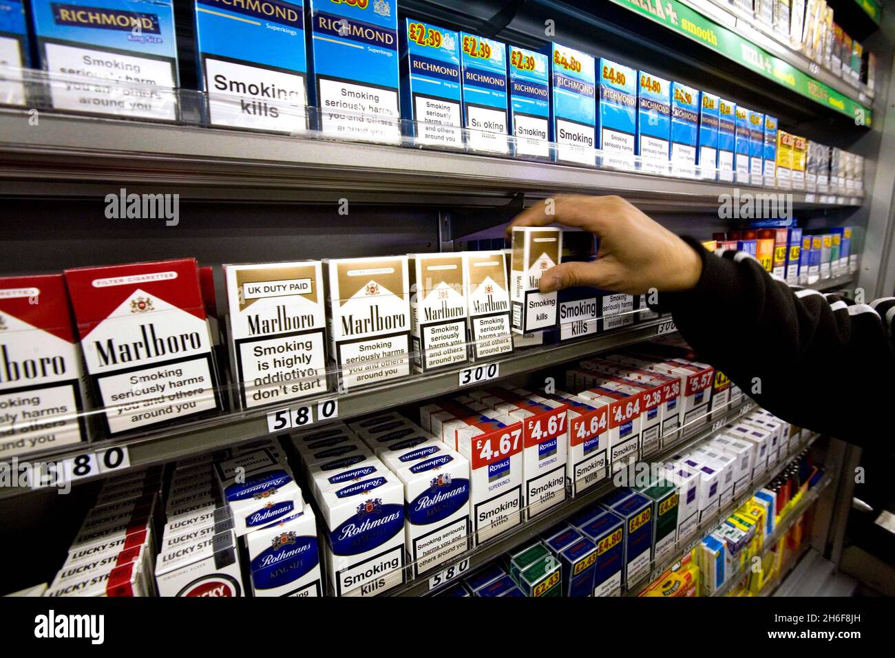 how much is tobacco in uk shops A display of cigarettes in a London shop today. The open display of tobacco  in shops is to be banned in England and Wales, the government has announced  today. But critics say