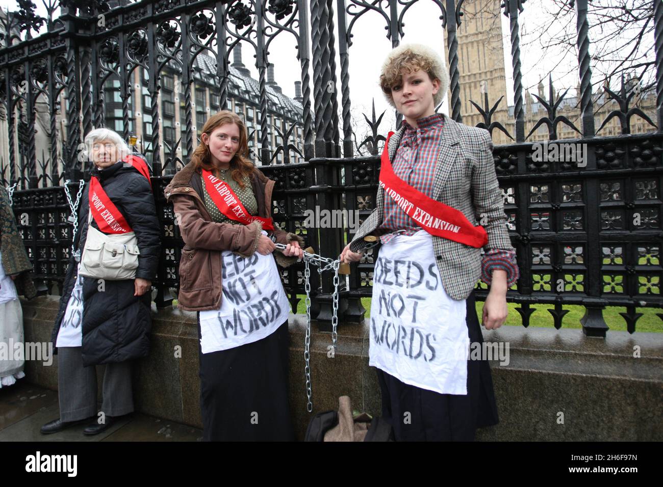 Protesters chained to the railings of the House Of Commons in London in demonstration against the proposed third runway at Heathrow Airport. Stock Photo