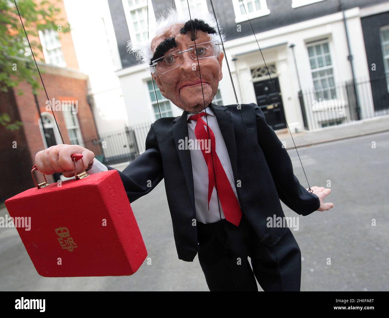 A puppet of Alistair Darling which a TV News broadcasting company decided to take to Downing Street this afternoon. Stock Photo