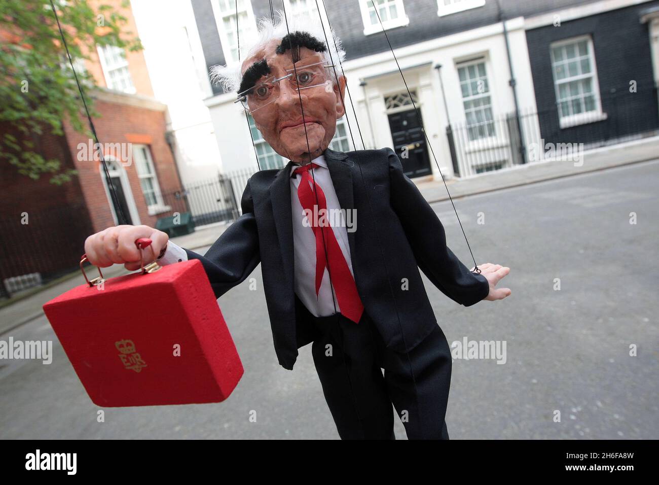 A puppet of Alistair Darling which a TV News broadcasting company decided to take to Downing Street this afternoon. Stock Photo