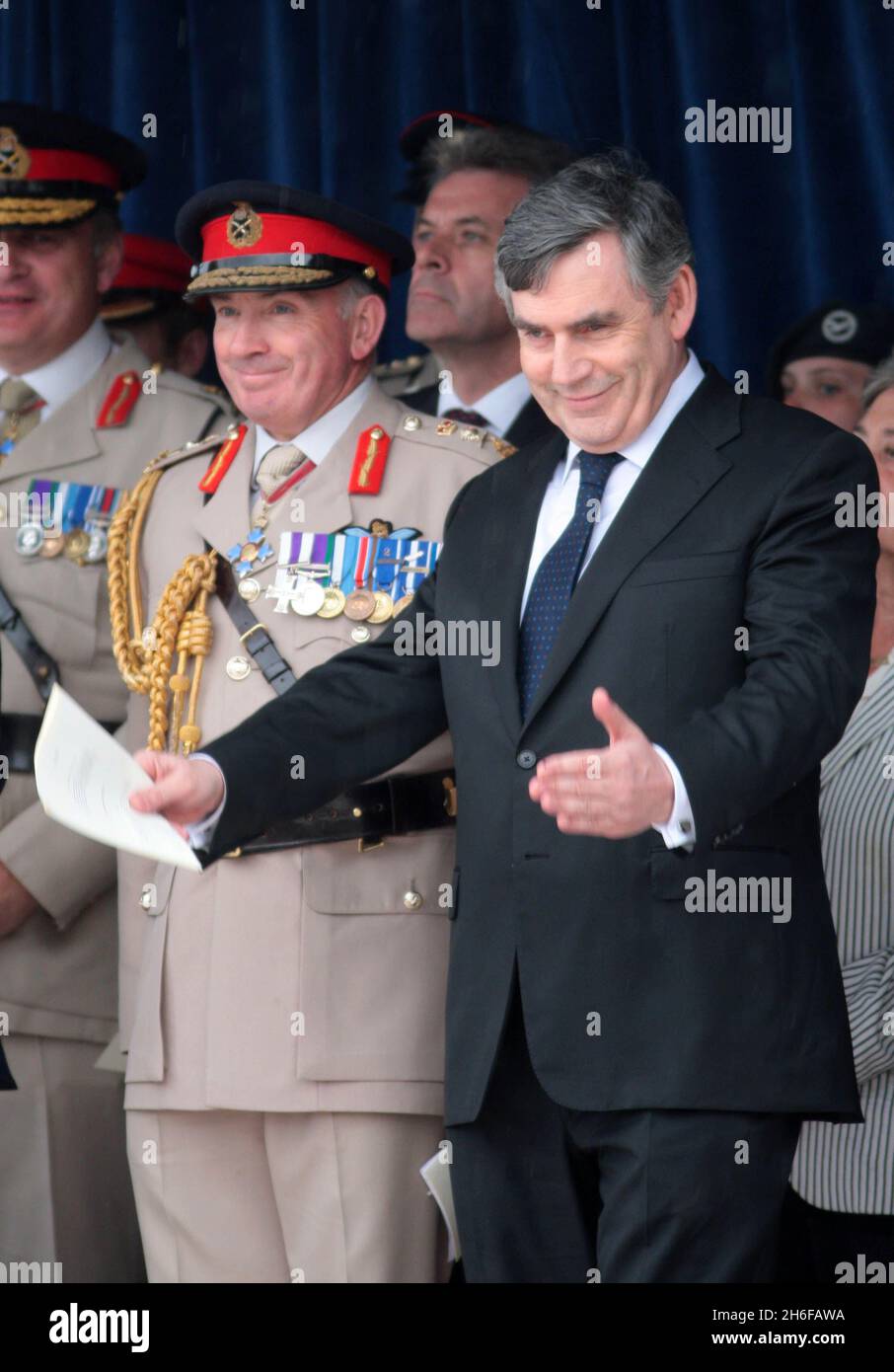 British Prime Minister Gordon Brown is booed during his speech to Normandy war veterans on the 65th D-Day anniversary in Arromanche, France. Stock Photo