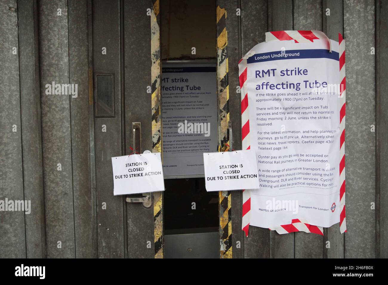 A sign at Mile End underground station saying that the station is closed due to strike action. Stock Photo