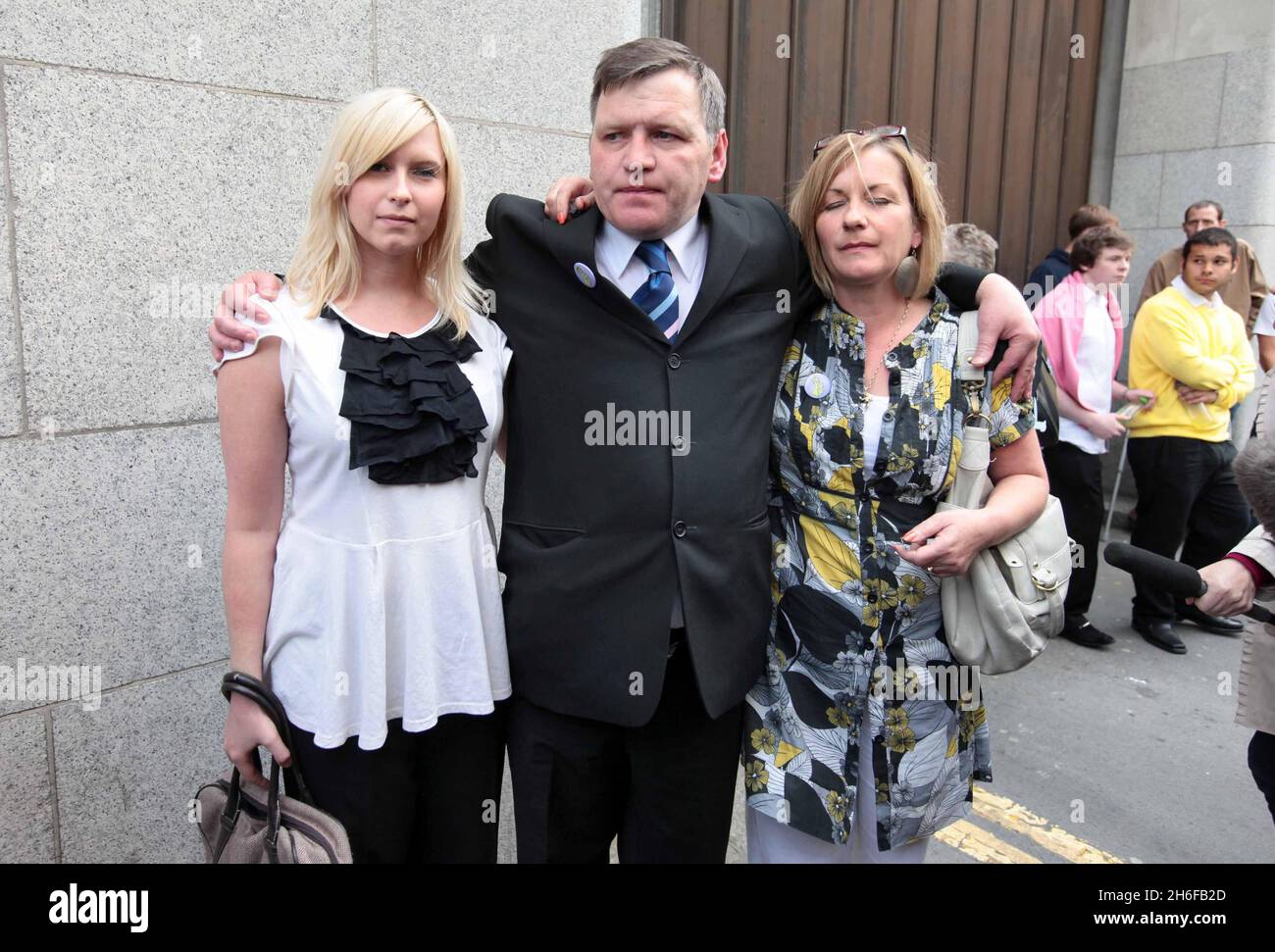 Brooke Kinsella with mother Deborah and father George Kinsella outside court for the sentencing of his Ben Kinsella's killers Juress Kika, Michael Alleyne and Jade Braithwaite at the Old Bailey this morning. Stock Photo