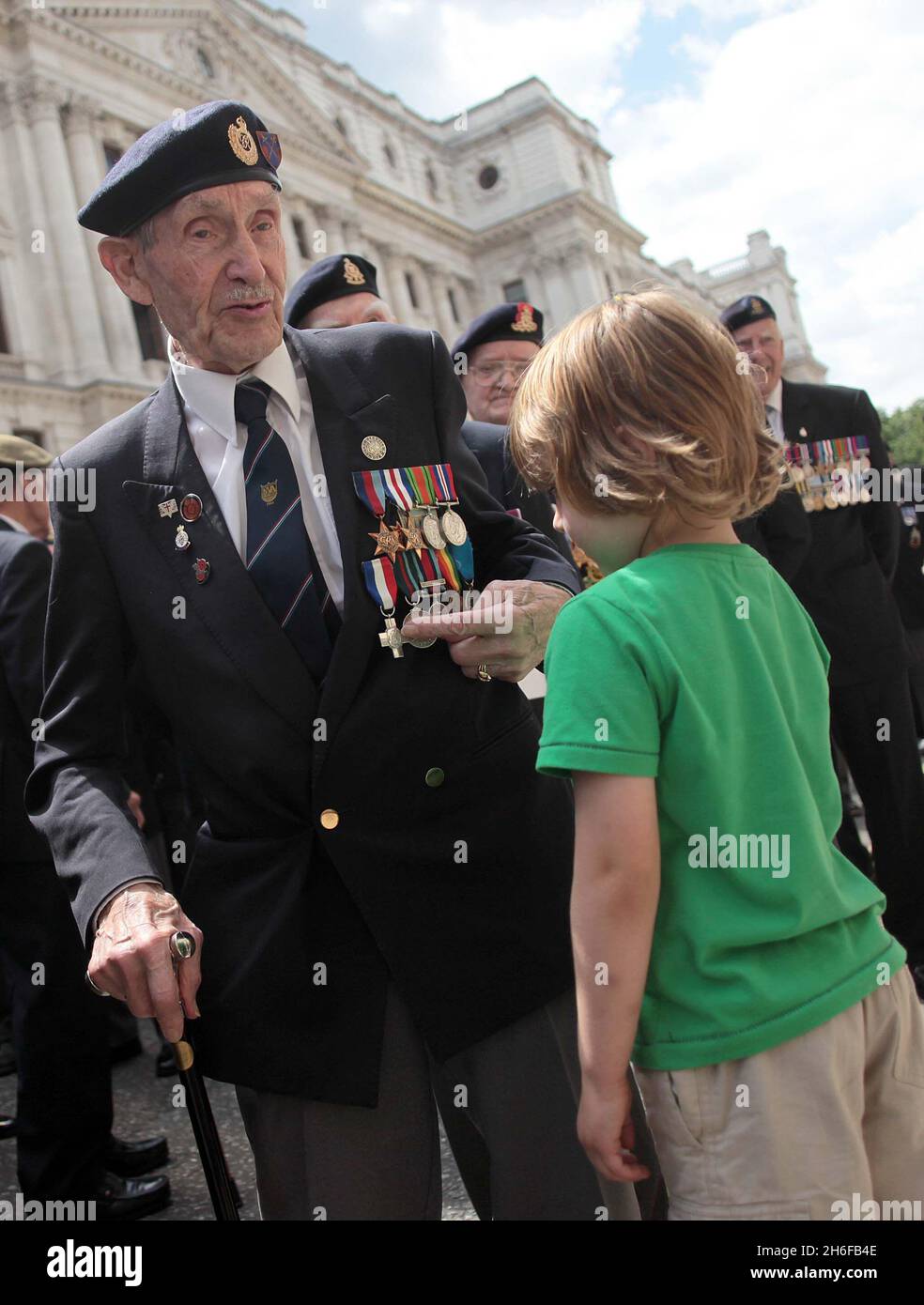 94 year old veteran Norman Lythgoe with his 5 year old Grandson Oscar Stock Photo