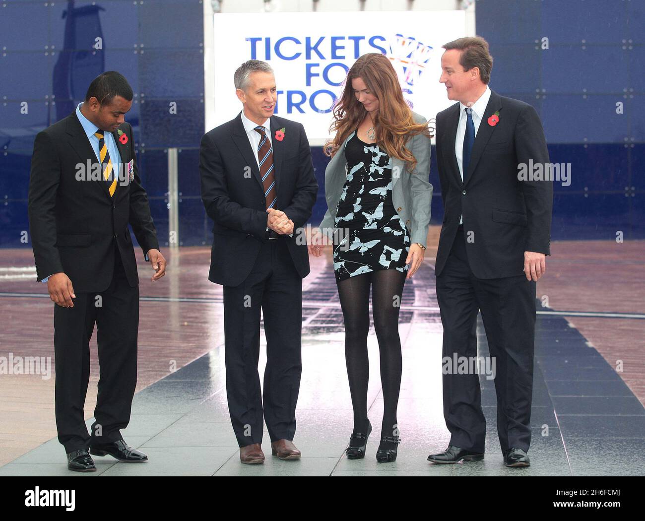 Conservative leader David Cameron launches his Tickets for Troops scheme encouraging promoters of music concerts and sporting events to give free tickets to soldiers. Picture shows: David Cameron with soldier Johnson Beharry, singer Joss Stone and former footballer Gary Lineker Stock Photo