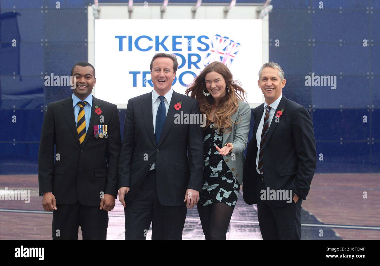 Conservative leader David Cameron launches his Tickets for Troops scheme encouraging promoters of music concerts and sporting events to give free tickets to soldiers. Picture shows: David Cameron with soldier Johnson Beharry, singer Joss Stone and former footballer Gary Lineker Stock Photo