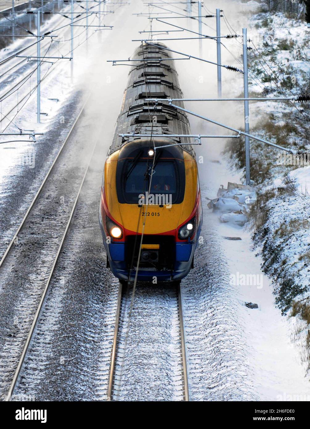 A commuter train in the snow in North London this morning Stock Photo