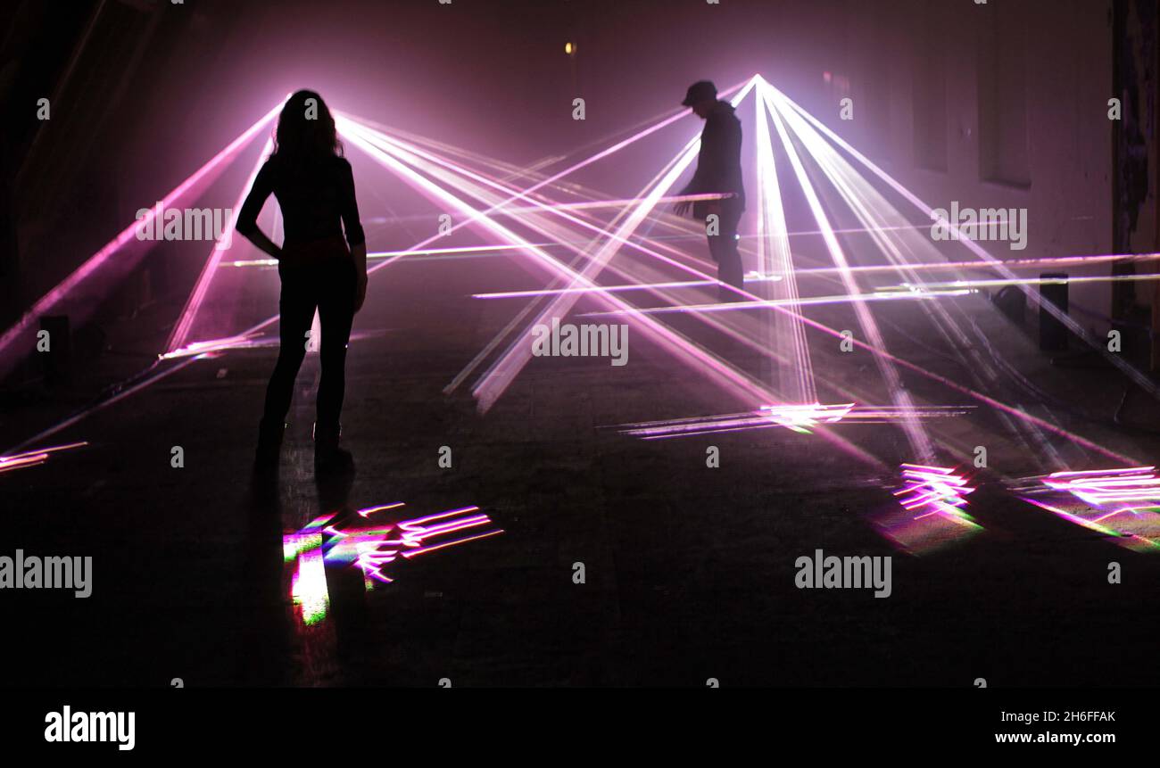 The 'Speed Of Light', an art installation using 148 lasers , has been installed across four floors and Six rooms of the Bargehouse on London's Southbank. The spectacular light show was designed by United Visual Artist (UVA) for Virgin Media, who is celebrating it's 10th anniversary of broadband in the UK. Stock Photo