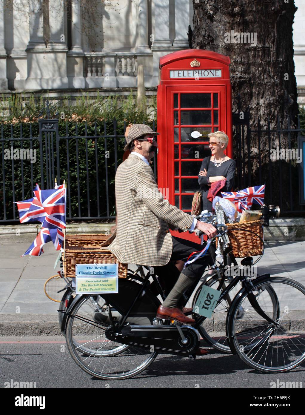 The 2nd Annual Tweed Run took place in London today. 400 ladies and gentlemen, dressed in plus-fours, Harris tweed jackets, merino wool team jerseys, silk cravats and jaunty flat caps, took a leisurely 14 mile ride across the capital enjoying all things quintessentially British from the bygone eras of the 1920s & 30s. Stock Photo