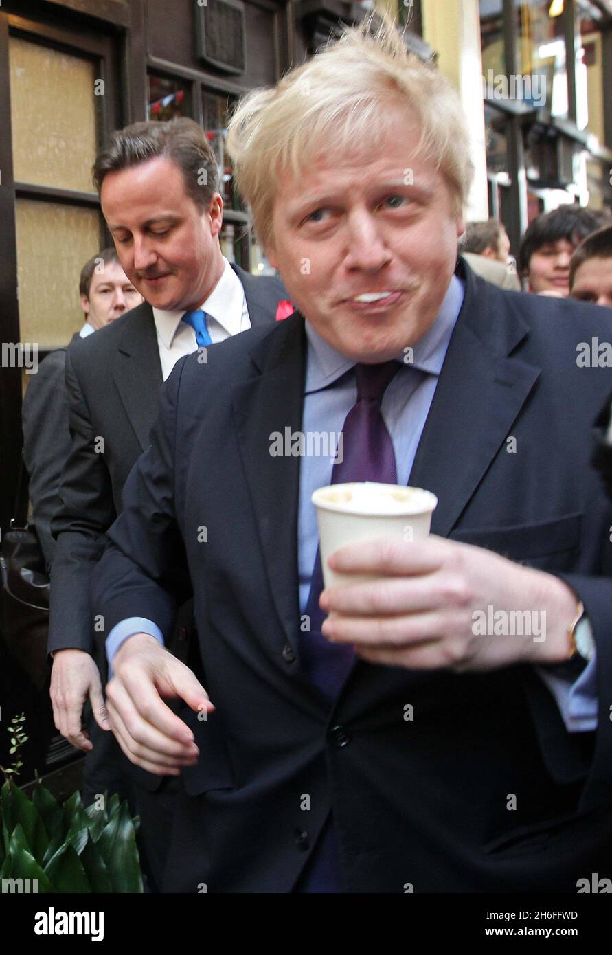 Conservative party leader David Cameron joined London Mayor Boris Johnson at St George's day celebrations in Leadenhall Market, London this afternoon Stock Photo