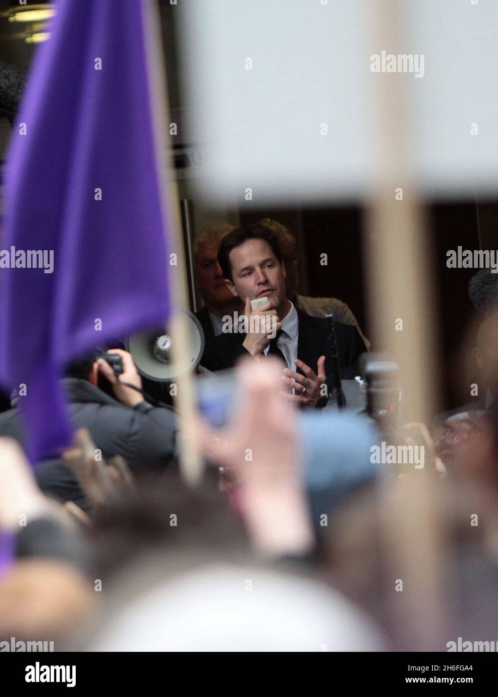 Protesters demanding proportional representation picketed a building where Nick Clegg and his Liberal Democrat front-bench team were meeting in London today Stock Photo