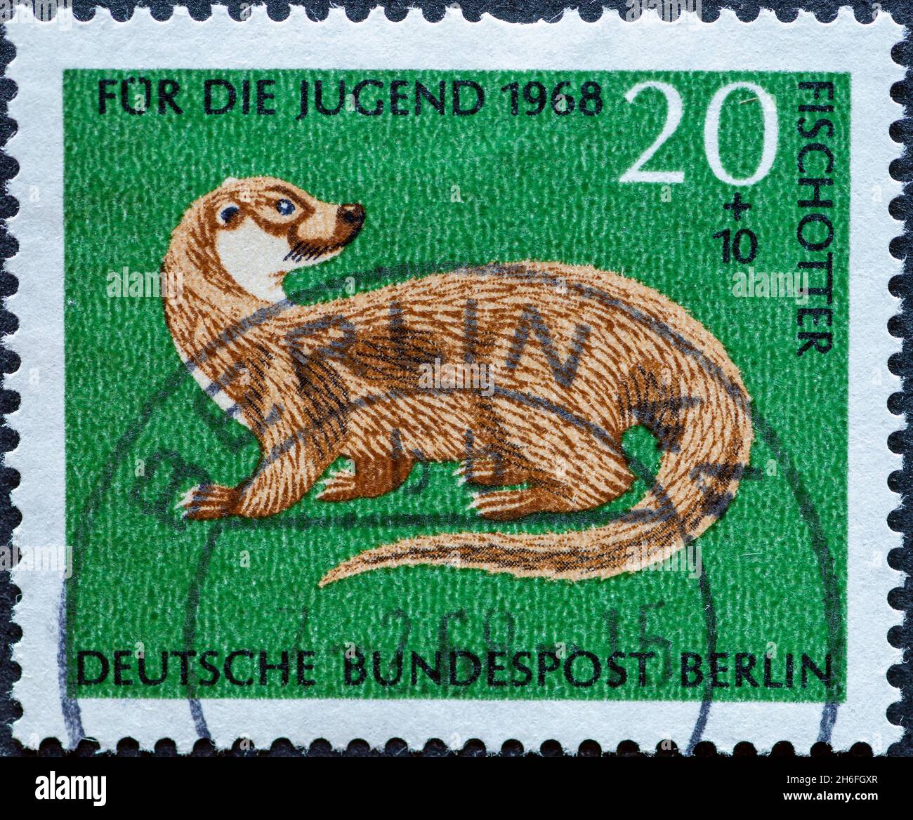 GERMANY, Berlin - CIRCA 1968: a postage stamp from Germany, Berlin showing rare wild animals. European ottert. charity postal stamp for the youth Stock Photo