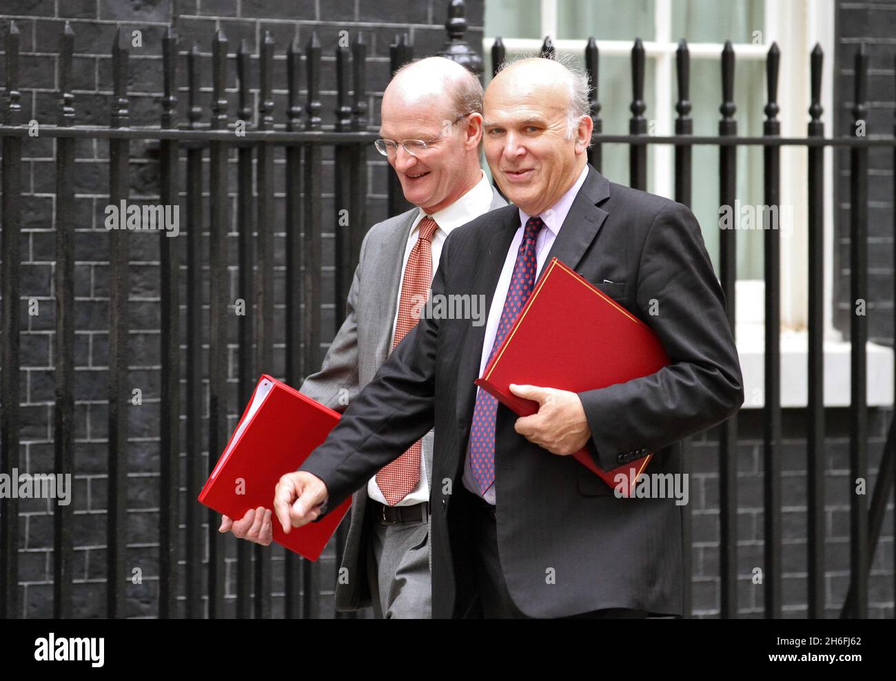 David Willets, Minister of State for Universities and Science and Vince Cable, Business Secretary, arrive in Downing Street this morning for the cabinet meeting. Stock Photo