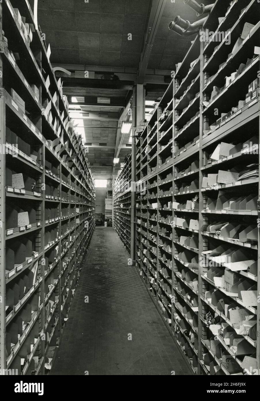 Detail of Ford spare parts central warehouse at Roma Capannelle with IBM punched cards, Italy 1960s Stock Photo
