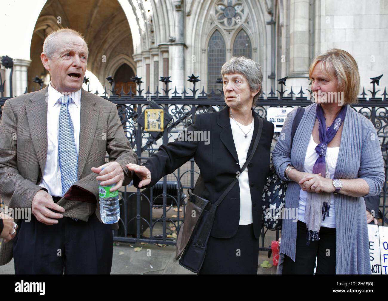 The inquests into the 7/7 bombings has begun at the High Court in London today. Hugo Keith QC, counsel to the inquests, began the hearing by reading out the names of the 52 innocent victims of the 2005 attacks. Picture shows: Family members of the victims arriving at the court. L-R Sean Cassidy whose son Kieran died at Kings Cross, Hazel Webb whose daughter died at Edgeware Road and Julie Nicolson whose daughter Jennifer died at Edgeware Road. Stock Photo