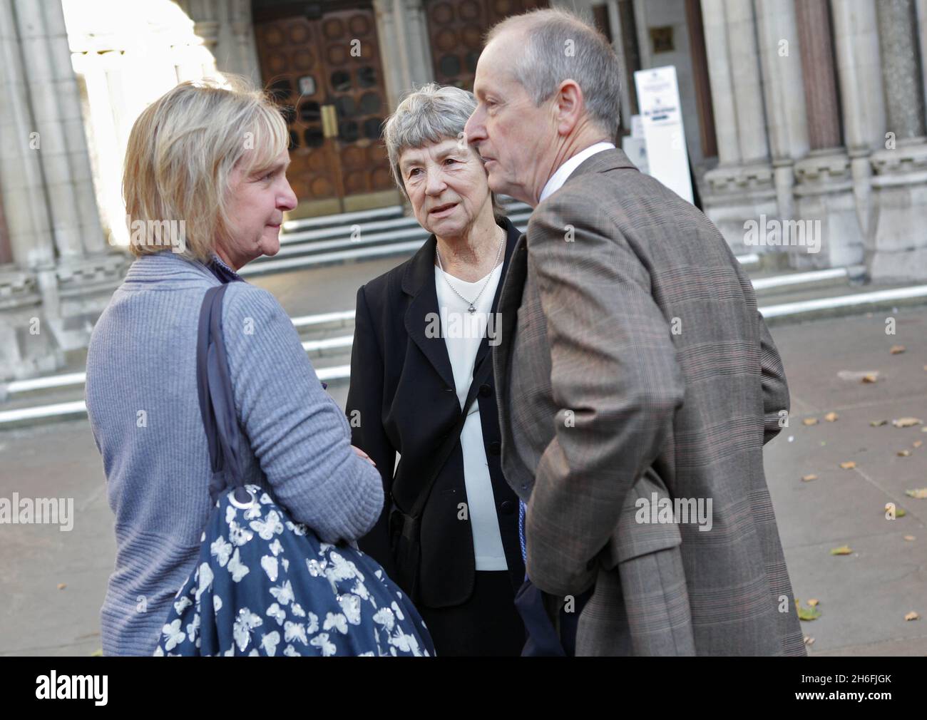 The inquests into the 7/7 bombings has begun at the High Court in London today. Hugo Keith QC, counsel to the inquests, began the hearing by reading out the names of the 52 innocent victims of the 2005 attacks. Picture shows: Family members of the victims arriving at the court. L-R Julie Nicolson whose daughter Jennifer died at Edgeware Road, Hazel Webb whose daughter died at Edgeware Road and Sean Cassidy whose son Kieran died at Kings Cross. Stock Photo