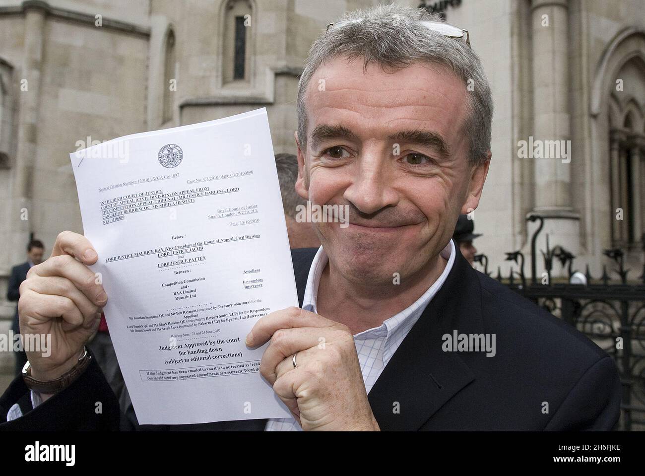 Ryan Air Boss Michael O'Leary pictured outside the High Court in London today after the court of appeal ruled that the BAA monopoly can now be broken up. The decision to dismiss the BAA monopoly's appeal against the Competition Commission's decision means that the sale of Glasgow and Stansted airports can now proceed, which will promote competition and a better deal for airport users and passengers. Stock Photo