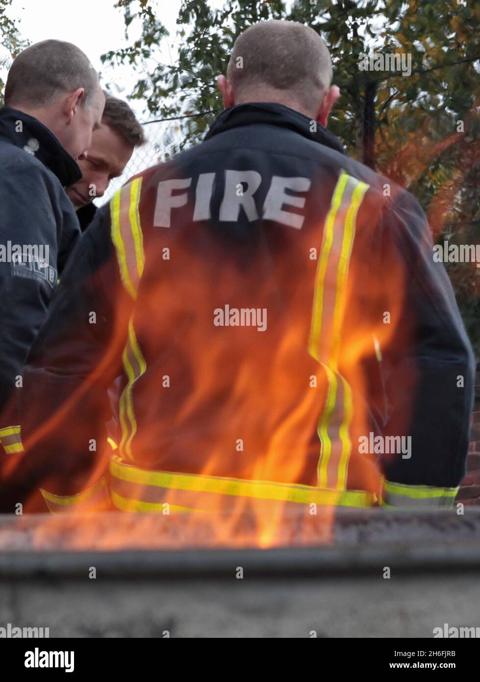 Firemen on strike outside their fire station in East London. The strikes involve 5,500 fire fighters in London, following a gulf between the London Fire Brigade (LFB) and the Fire Brigades Union (FBU) regarding changes to working practices Stock Photo