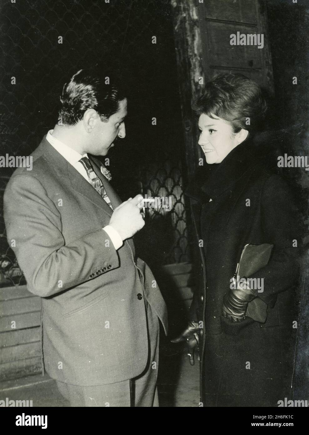 Spanish aristocrat and actor Jaime de Mora y Aragon talking to Christiane Sassard, 1960s Stock Photo